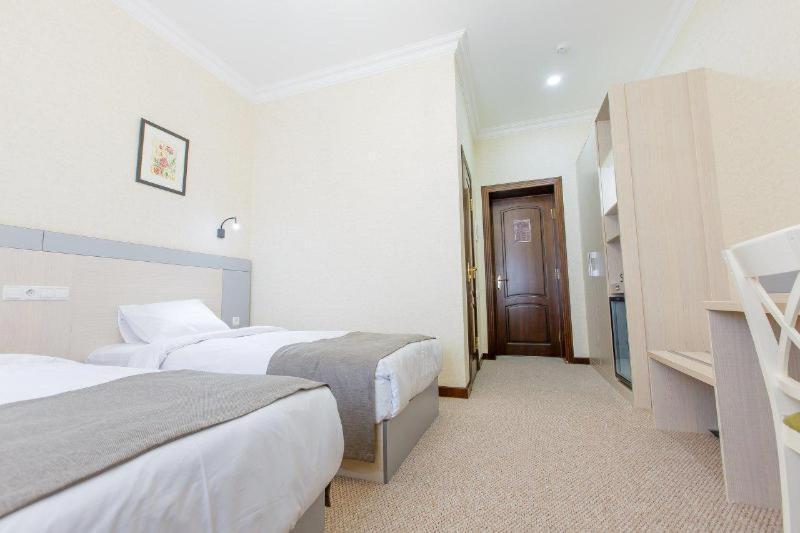 Navruz Hotel Taskent Habitación foto